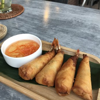 Ngon Vietnamese Kitchen - GULF SHRIMP ROLLS ($8) flash-fried rolls, shrimp, imitation crab, cream cheese, served with nuoc mam (fish sauce) - Vietnamese Near Me - Dallas, Texas