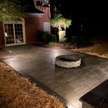 Champion Gardens - New patio and fire pit with retaining wall - Landscaping Near Me Champion Gardens - New patio and fire pit with retaining wall - Landscaping Near Me