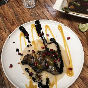 Tras Horizonte BY Kokopelli - Pólvora tacos, salmon with black molé sauce and mango and pomegranate salsa. So delish! :) - Mexican Near Me - Tijuana, BCN Tras Horizonte BY Kokopelli - Pólvora tacos, salmon with black molé sauce and mango and pomegranate salsa. So delish! :) - Mexican Near Me - Tijuana, BCN