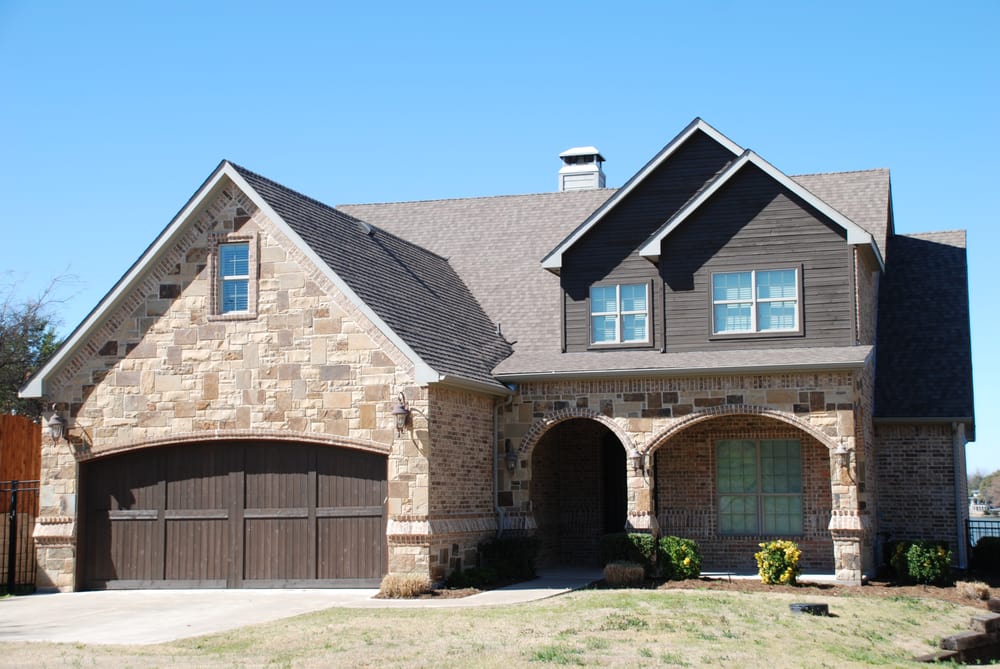 Slide of Compass Roofing