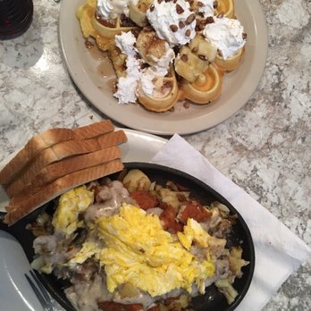 Pop's Diner Co. - The country skillet with amazing sausage gravy, laid over home fries and topped with eggs! The waffles are pecan! - Diners Near Me - Virginia Beach, Virginia Pop's Diner Co. - The country skillet with amazing sausage gravy, laid over home fries and topped with eggs! The waffles are pecan! - Diners Near Me - Virginia Beach, Virginia