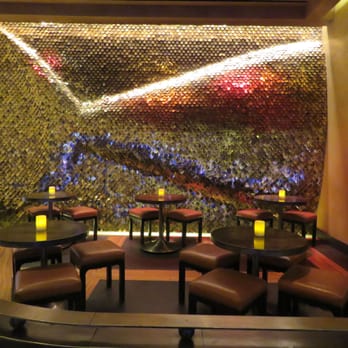 Yellowtail Japanese Restaurant & Lounge - The fin design on the casino floor with the cocktail tables. - Japanese Near Me - Las Vegas, Nevada