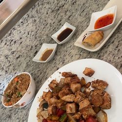 ADV Forest Grill - Sesame chicken, egg roll and sauces.