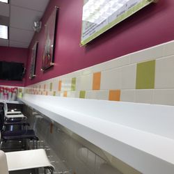 Yogi Castle - Bar seating area across from the frozen yogurt machines.