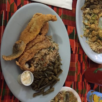 Kente's - Fried fish with vegetable rice and green beans. Also featuring a partially demolished small plate of chicken curry. - Soup Near Me - Hampton, Virginia Kente's - Fried fish with vegetable rice and green beans. Also featuring a partially demolished small plate of chicken curry. - Soup Near Me - Hampton, Virginia