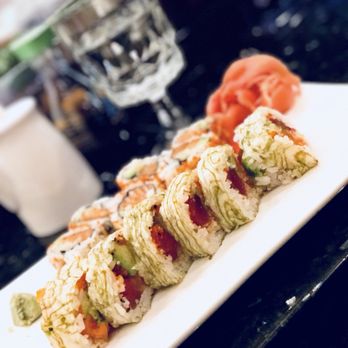 Isohama - Rainbow roll pictured in front - Japanese Near Me - New York, New York Isohama - Rainbow roll pictured in front - Japanese Near Me - New York, New York