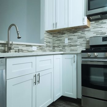 Venture Home Improvement - a kitchen with stainless steel appliances - General Contractors Near Me Venture Home Improvement - a kitchen with stainless steel appliances - General Contractors Near Me