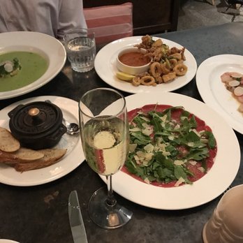 Le Zoo - Cucumber soup, escargot, calamari, beef carpaccio, and the hamachi. Everything was great. - French Near Me - Miami Beach, Florida