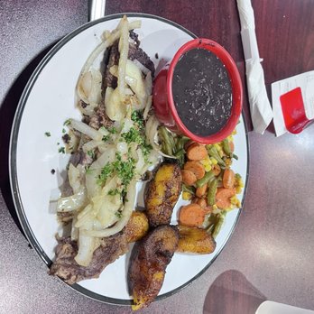 La Granja - 1 Lb. Grilled Steak with Grilled Onions - Peruvian Near Me - Orlando, Florida La Granja - 1 Lb. Grilled Steak with Grilled Onions - Peruvian Near Me - Orlando, Florida