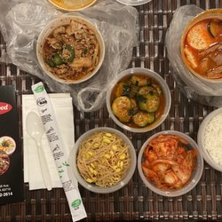 Korean Mart - My takeout order: Soft tofu soup (soondubu), spicy pork, rice, and side dishes (banchan) of kimchi, bean sprouts and cucumber kimchi