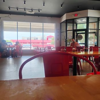 Dave's Hot Chicken - I like the Red Chairs and nice large windows. - Chicken Shop Near Me - Fort Worth, Texas