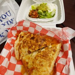 famous Restaurant - Chicken quesadilla, to go.