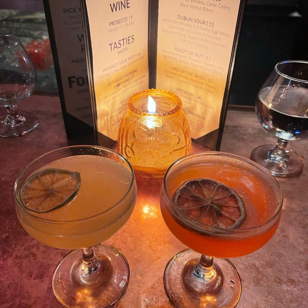 Garden gin cocktail- left, Lord of the Skies- right (tequila based drink) Garden gin cocktail- left, Lord of the Skies- right (tequila based drink)