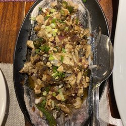 Globy Traveling Chef Restaurant - Bangus Sisig or sizzling Bangus (served on a sizzling hot black cast iron dish)