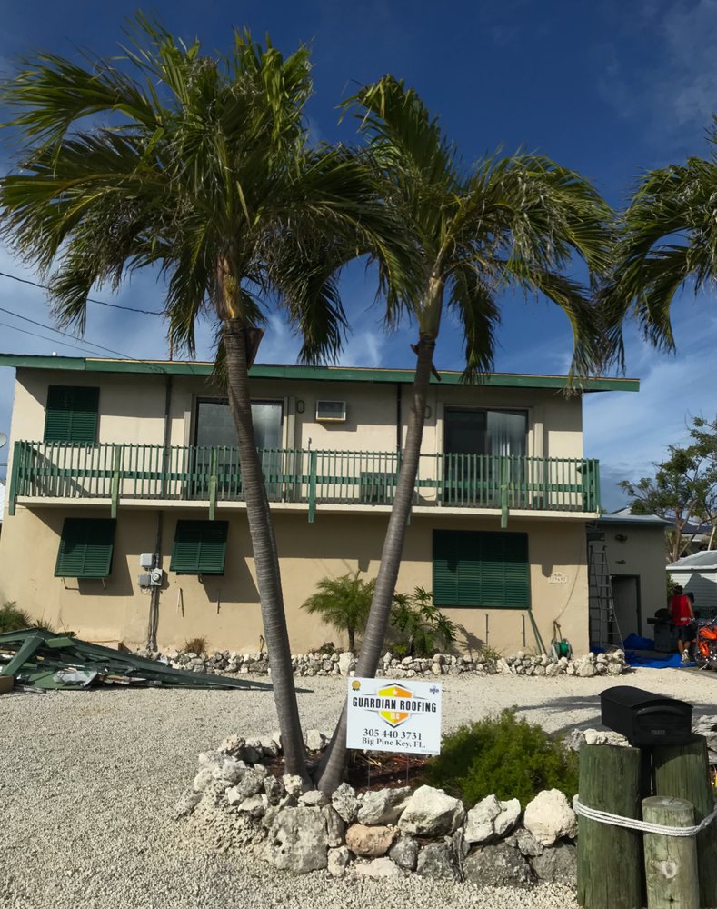 Slide of Guardian Roofing