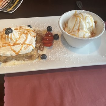 Francey Brady's - Freshly Baked Warm Apple Crisp Ala Mode Dinner with caramel drizzle plus whipped cream on top of the apple pie - Irish Pub Near Me - Yonkers, New York Francey Brady's - Freshly Baked Warm Apple Crisp Ala Mode Dinner with caramel drizzle plus whipped cream on top of the apple pie - Irish Pub Near Me - Yonkers, New York