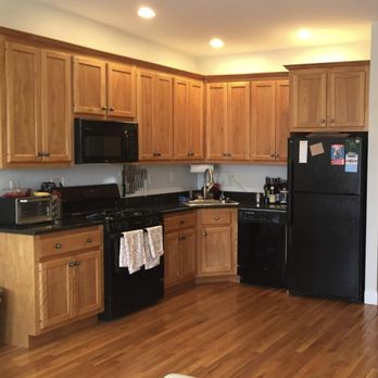 Mario's Professional Painting - The before shot of my kitchen cabinets - Painters Near Me