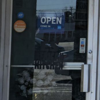E S African Kitchen - The sign indicates that the establishment is open. However, the doors are locked, and it appears that no one is present. - African Near Me - Portsmouth, Virginia E S African Kitchen - The sign indicates that the establishment is open. However, the doors are locked, and it appears that no one is present. - African Near Me - Portsmouth, Virginia