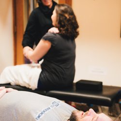 BoDo Chiropractic - Dr. Jen adjusting a father-and-daughter-duo!