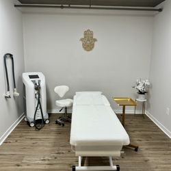 Glow By Laser - Our laser hair removal room featuring the BAREit by Sciton