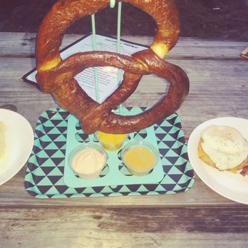 Shuffle - Cheese biscuit + fried egg. Pretzel with mustard, spicey dip, and I think honey mustard, and an egg and bacon biscuit. - Social Clubs Near Me - Tampa, Florida