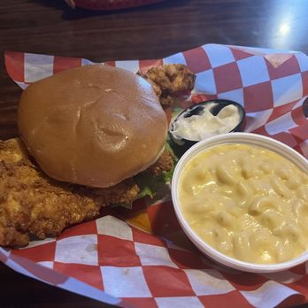 The Chicken - Classic chicken sandwich, Nashville Hot on a brioche bun. - Chicken Shop Near Me - Cumming, Iowa