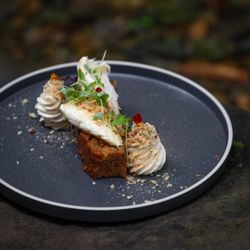 Daisy’s Place - Homemade carrot cake with lemon cream cheese icing and walnuts.