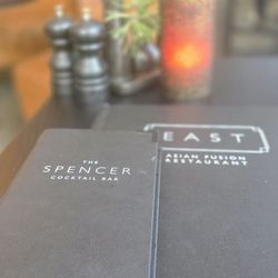 East Restaurant - Menu and table decor ...