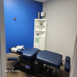 Caruso Family Chiropractic - Private chiropractic treatment room with a professional adjustment table used for precise chiropractic care.