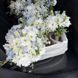The brides bouquet and bridal parties bouquets