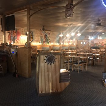 Pancho Villa - a dining area with tables and chairs - Mexican Near Me - Albemarle, North Carolina