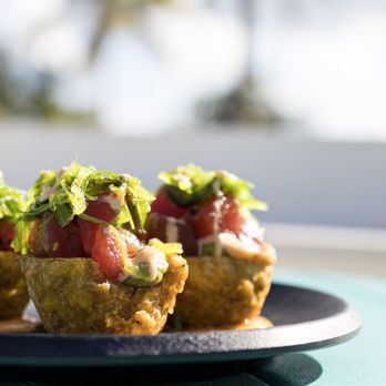 Seaside Cafe - Island Poke Cups
Raw ahi tuna marinated in a sesame ponzu sauce,
guacamole and seaweed salad topped with a drizzle
of spicy mayo - Pizza Near Me - Key West, Florida Seaside Cafe - Island Poke Cups
Raw ahi tuna marinated in a sesame ponzu sauce,
guacamole and seaweed salad topped with a drizzle
of spicy mayo - Pizza Near Me - Key West, Florida