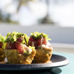 Seaside Cafe - Island Poke Cups
Raw ahi tuna marinated in a sesame ponzu sauce,
guacamole and seaweed salad topped with a drizzle‌
of spicy mayo
