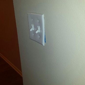 Storey Construction - This is how sub-contractors left a light plate...I mean we had to ask this be remedied. - Painters Near Me - Austin, Texas