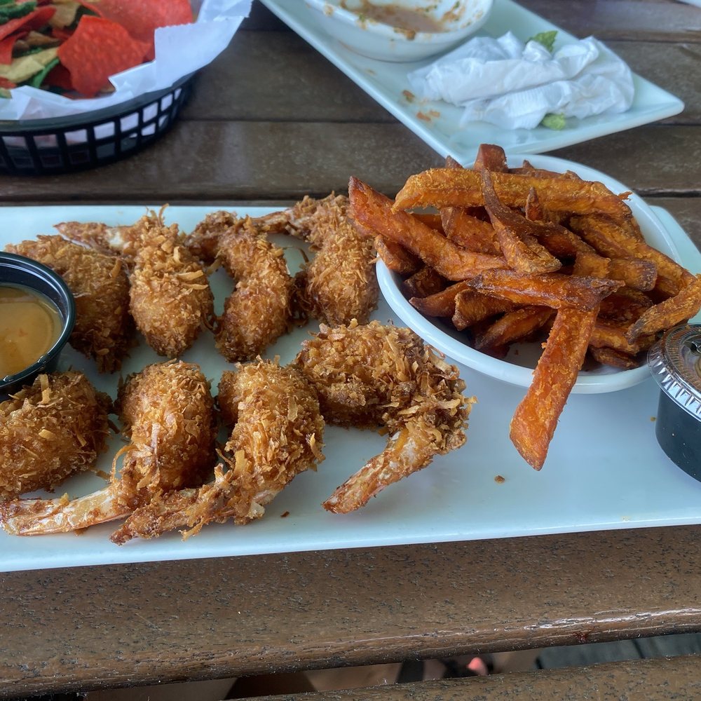 Coconuts On The Beach - Coconut shrimp & Sweet Potato Fries - Bars Near Me - Cocoa Beach, Florida Coconuts On The Beach - Coconut shrimp & Sweet Potato Fries - Bars Near Me - Cocoa Beach, Florida