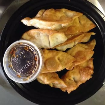 New Great Wall - a plate of empanadas and a cup of sauce - Chinese Near Me - Hewlett, New York New Great Wall - a plate of empanadas and a cup of sauce - Chinese Near Me - Hewlett, New York