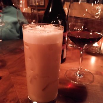 Ember - Boozy iced chai (with almond milk, house made chai syrup, rum, and kahlua).  Packs a punch, but tastes dangerously non-boozy - New American Near Me - Arroyo Grande, California