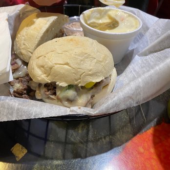 Dagwood's Deli - a person eating a sandwich - Delis Near Me - Bloomington, Indiana