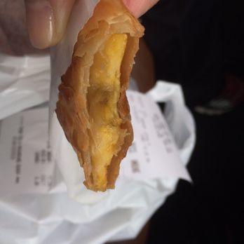 Pinoy Hub - This crispy number boasts a very satisfying filling of banana and jackfruit!! - Food Court Near Me - Toronto, Ontario Pinoy Hub - This crispy number boasts a very satisfying filling of banana and jackfruit!! - Food Court Near Me - Toronto, Ontario