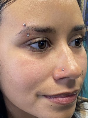 Piercing - Valhalla Modifications is located on the Historic Miracle Mile. Family owned and operated, our inclusive studio is here for your body adornment needs. Valhalla Modifications, originally located in Northern Arizona in 2000, resurrected in 2022.
We appreciate our clients and want to provide a safe, comfortable environment for them to adorn their bodies. Come meet our friendly, skilled, tattoo artists and body piercers, and check out our body jewelry options. Piercing - Valhalla Modifications is located on the Historic Miracle Mile. Family owned and operated, our inclusive studio is here for your body adornment needs. Valhalla Modifications, originally located in Northern Arizona in 2000, resurrected in 2022.
We appreciate our clients and want to provide a safe, comfortable environment for them to adorn their bodies. Come meet our friendly, skilled, tattoo artists and body piercers, and check out our body jewelry options.