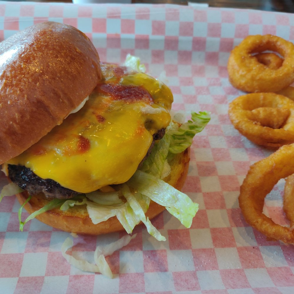 Burger 82 - Cheeseburger with a side of onion rings - Burgers Near Me - Allen, Texas Burger 82 - Cheeseburger with a side of onion rings - Burgers Near Me - Allen, Texas