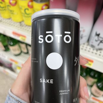 Oriental Mart - a person holding a soda can - International Grocery Near Me - Lauderhill, Florida