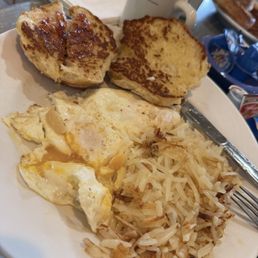 Fried eggs, hash browns and a biscuit. Yum!