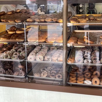 Happy Donuts - Donut display case - Donuts Near Me - Puyallup, Washington Happy Donuts - Donut display case - Donuts Near Me - Puyallup, Washington