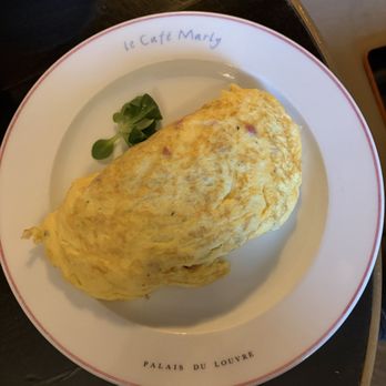 Le Café Marly - Omelette with ham and cheese - French Near Me - Paris, 75 Le Café Marly - Omelette with ham and cheese - French Near Me - Paris, 75