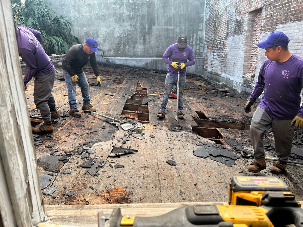 Slide of Voodoo Roofing