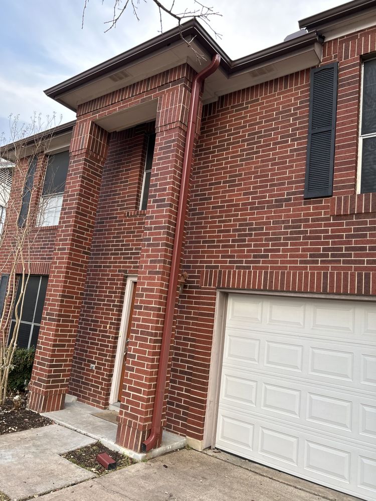 Slide of Gonzalez Seamless Rain Gutters