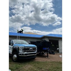 Alliance Group - Alliance Group LLC roofers installing a 24-gauge standing seam metal roof system on a new construction project.