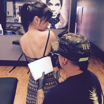 Mainland Ink Tattoo - Regina tracing the outline of my shark tooth design. - Tattoo Near Me - Fremont, California Mainland Ink Tattoo - Regina tracing the outline of my shark tooth design. - Tattoo Near Me - Fremont, California