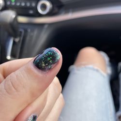 Blue Sky Nails & Lash - You can see they tried to fix the huge chunks of white overlay by just removing the paint on the nail.